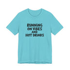 T‑Shirt — "Running on Vibes and Hot Drinks" Graphic Tee