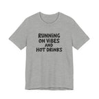 T‑Shirt — "Running on Vibes and Hot Drinks" Graphic Tee
