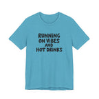 T‑Shirt — "Running on Vibes and Hot Drinks" Graphic Tee