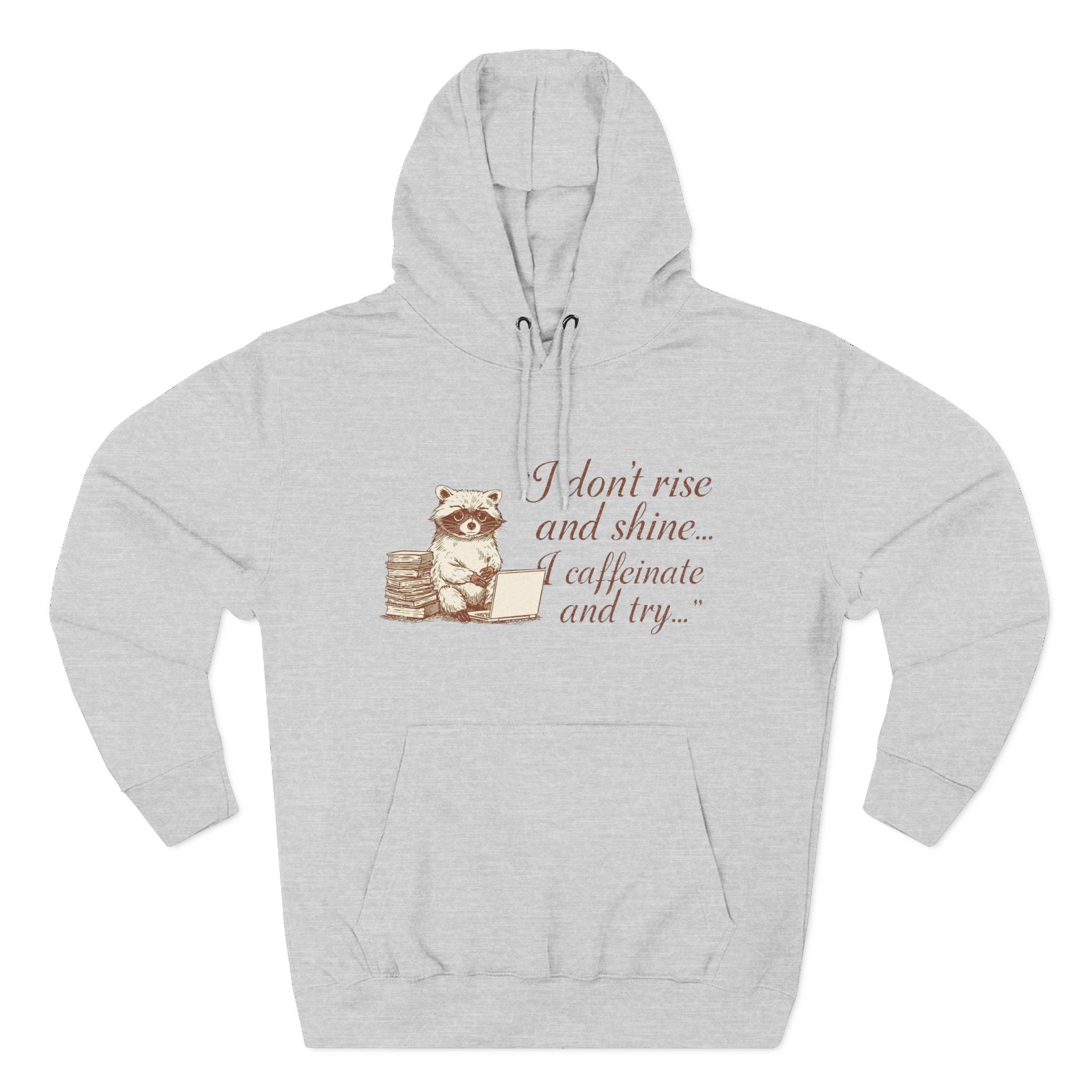 Cozy Raccoon Coffee Hoodie — "I don't rise and shine... I caffeinate and try" Fleece Pullover