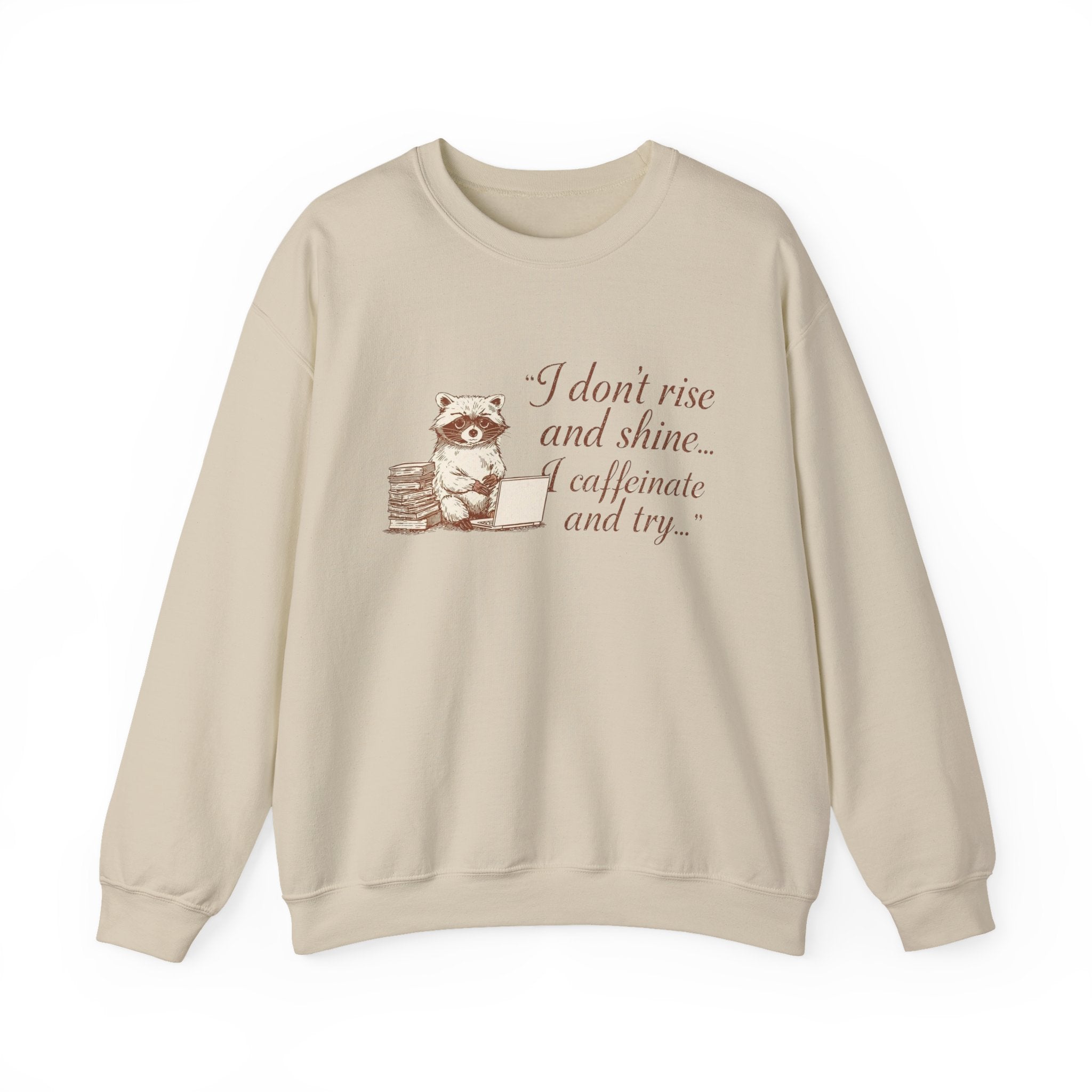 Cozy Raccoon Coffee Sweatshirt — "I don't rise and shine... I caffeinate and try" Crewneck