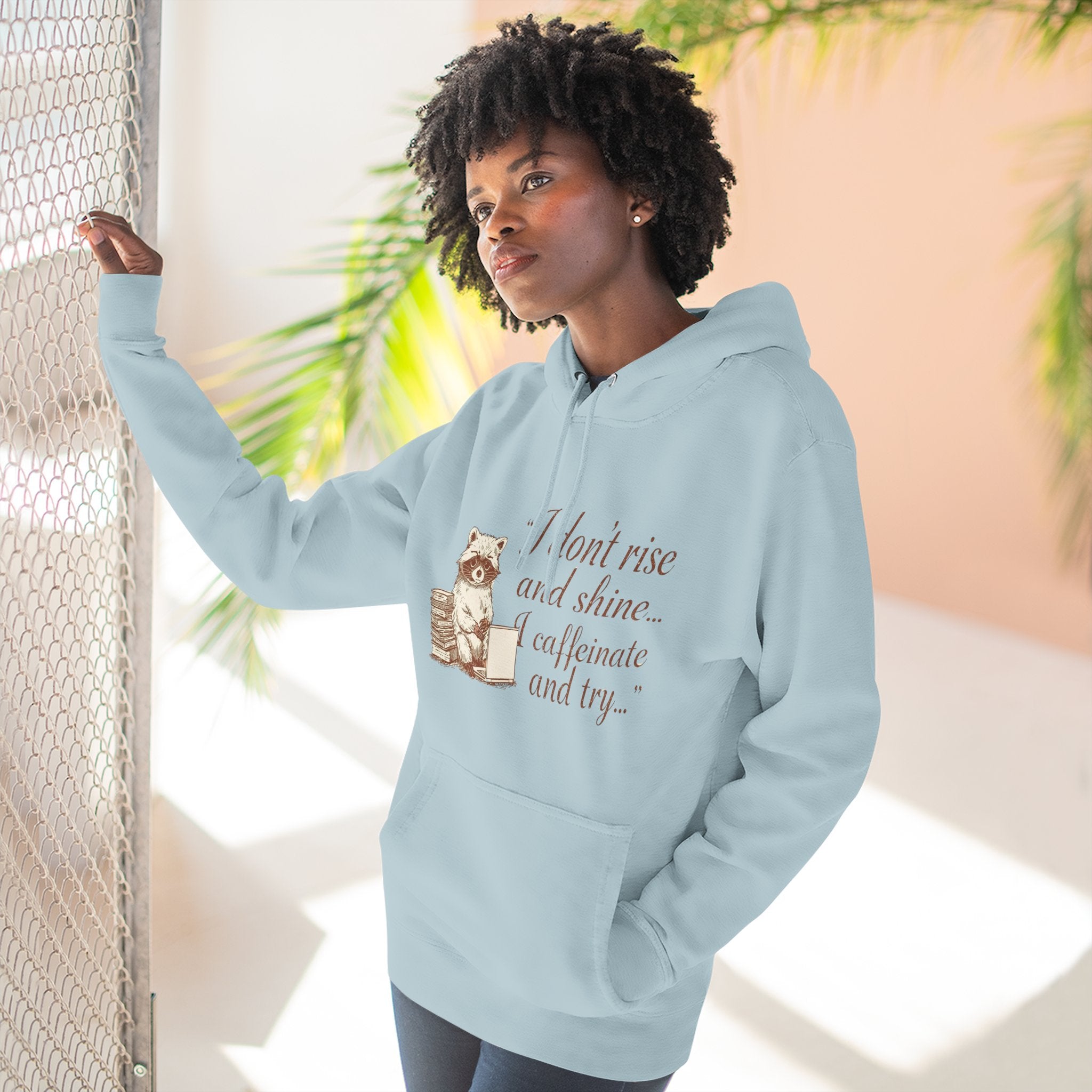 Cozy Raccoon Coffee Hoodie — "I don't rise and shine... I caffeinate and try" Fleece Pullover